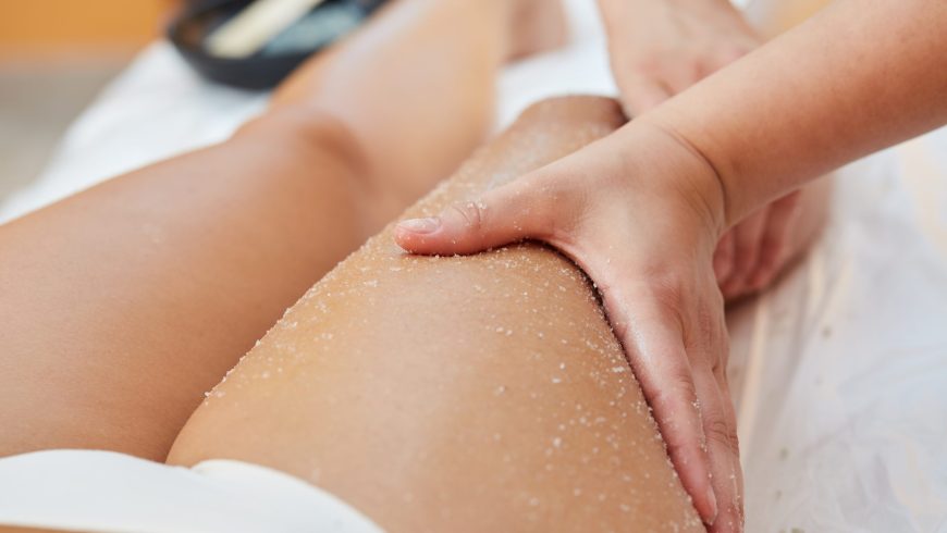 Woman Getting a Salt Scrub Beauty Treatment in the Health Spa